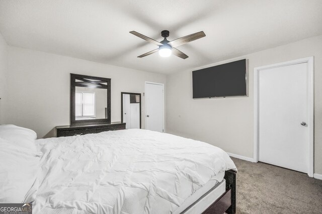 933 Chisholm Trl, Macon, GA 31220 - bedroom featuring carpet flooring, baseboards, and ceiling fan