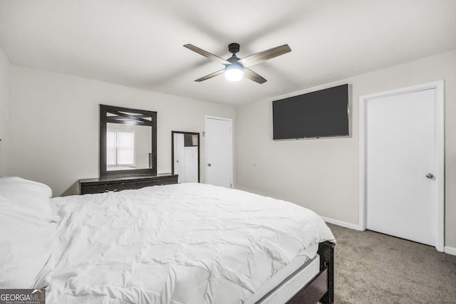 933 Chisholm Trl, Macon, GA 31220 - carpeted bedroom with baseboards and a ceiling fan