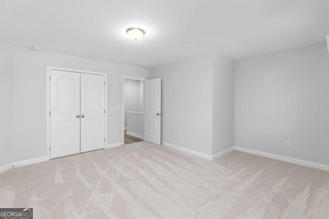 2133 Kirkham Way, Kennesaw, GA 30152 - unfurnished bedroom with carpet floors, a closet, and baseboards