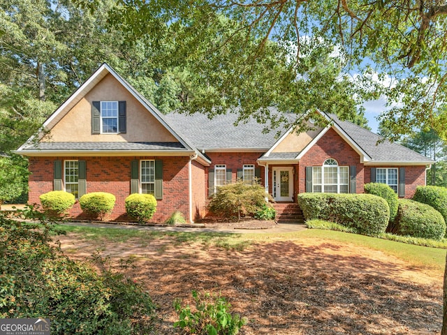925 Champions Way, Mcdonough, GA 30252 - view of front of home featuring brick siding and a shingled roof