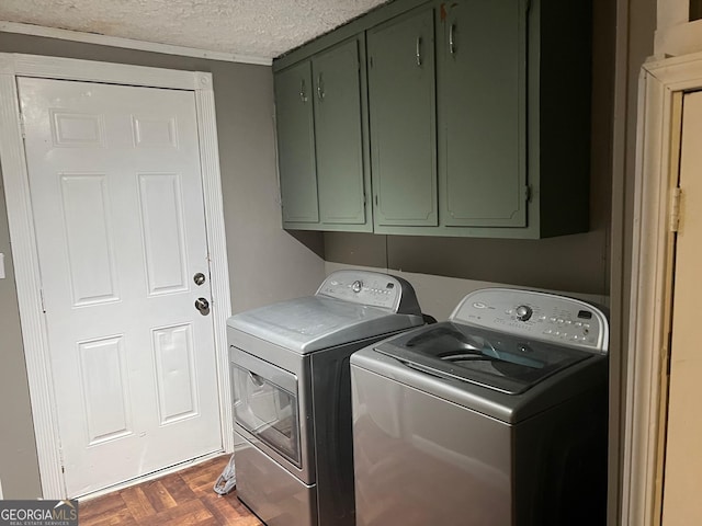 7138 Rockland Rd, Lithonia, GA 30038 - washroom with independent washer and dryer, cabinet space, and a textured ceiling