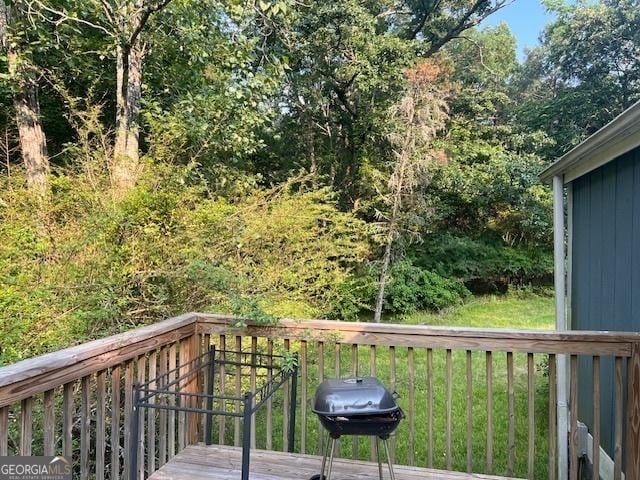 7138 Rockland Rd, Lithonia, GA 30038 - wooden terrace featuring a grill