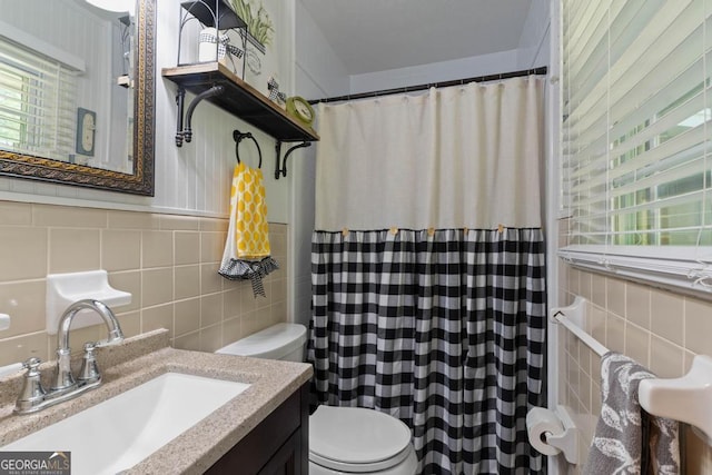 118 Duvall Dr, Stockbridge, GA 30281 - full bath with tile walls, vanity, and curtained shower