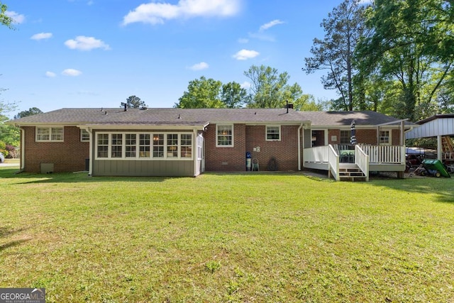 118 Duvall Dr, Stockbridge, GA 30281 - rear view of property featuring a wooden deck, brick siding, and a yard