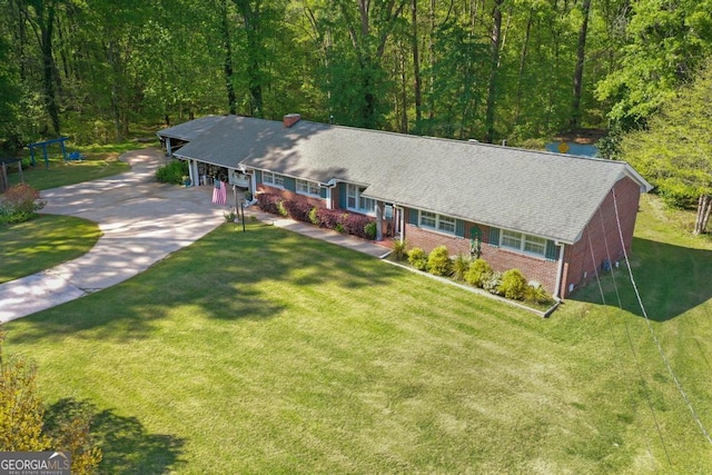 118 Duvall Dr, Stockbridge, GA 30281 - ranch-style house featuring a view of trees and a front lawn