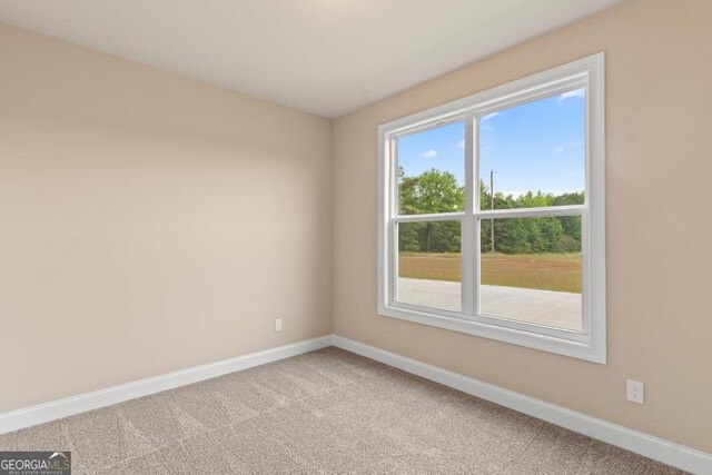 123 Oak Rd, Locust Grove, GA 30248 - unfurnished room featuring baseboards and carpet flooring