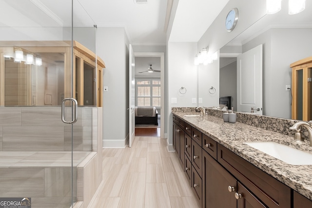 3280 Stillhouse Ln SE Unit 410, Atlanta, GA 30339 - ensuite bathroom with double vanity, ornamental molding, a stall shower, and baseboards