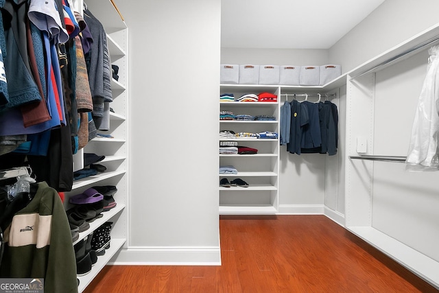3280 Stillhouse Ln SE Unit 410, Atlanta, GA 30339 - walk in closet with wood finished floors