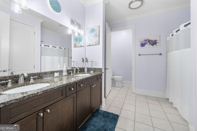 3280 Stillhouse Ln SE Unit 410, Atlanta, GA 30339 - bathroom featuring double vanity, ornamental molding, toilet, tile patterned flooring, and baseboards