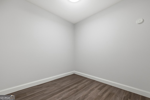 3280 Stillhouse Ln SE Unit 410, Atlanta, GA 30339 - unfurnished room with dark wood-style flooring and baseboards