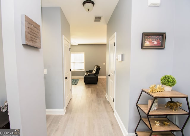 4560 Buckskin Way, Douglasville, GA 30135 - corridor with light wood-style flooring and baseboards