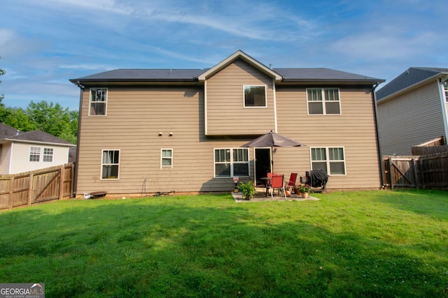 4560 Buckskin Way, Douglasville, GA 30135 - back of house featuring a gate and a patio
