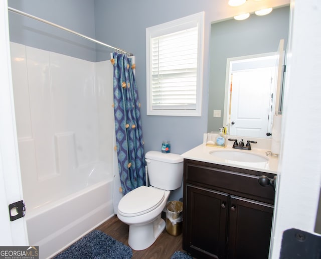 4560 Buckskin Way, Douglasville, GA 30135 - full bathroom with toilet, vanity, shower / bath combination with curtain, and wood finished floors