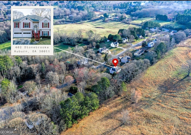 402 Stonebrooke Dr, Auburn, GA 30011 - aerial view of property and surrounding area with property parcel outlined