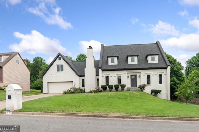 1645 Oakfield Ln, Roswell, GA 30075 - modern farmhouse style home featuring a chimney, roof with shingles, driveway, a front lawn, and stucco siding