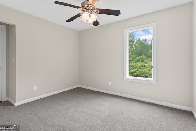 1645 Oakfield Ln, Roswell, GA 30075 - unfurnished room with carpet flooring, baseboards, and a ceiling fan