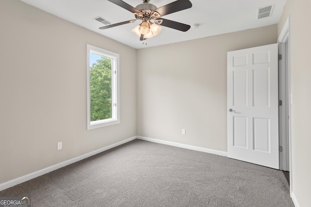 1645 Oakfield Ln, Roswell, GA 30075 - carpeted empty room with baseboards and ceiling fan