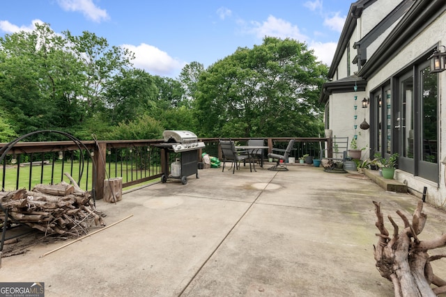 1645 Oakfield Ln, Roswell, GA 30075 - view of patio featuring area for grilling and outdoor dining space