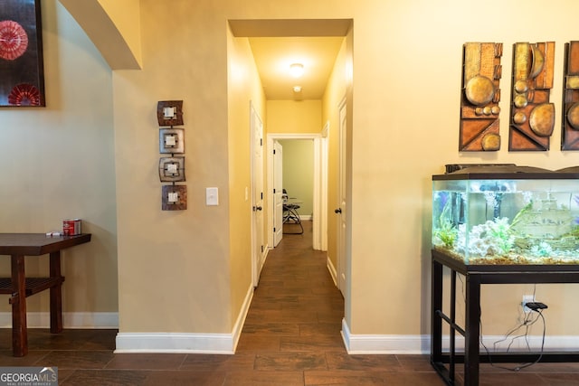 366 Highbranch Cir, Lawrenceville, GA 30044 - hall featuring arched walkways, baseboards, and dark wood-style flooring
