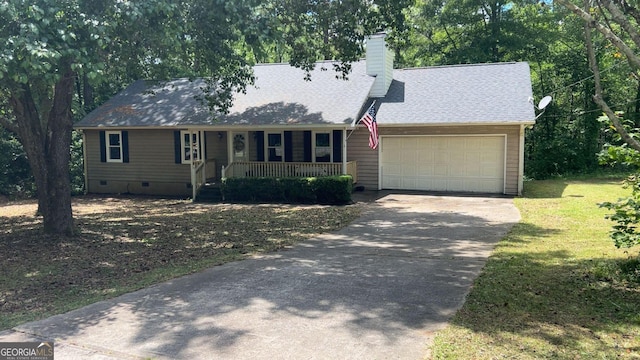 1751 Brindle Ln, Macon, GA 31220 - view of front of house featuring a porch, an attached garage, crawl space, concrete driveway, and a chimney