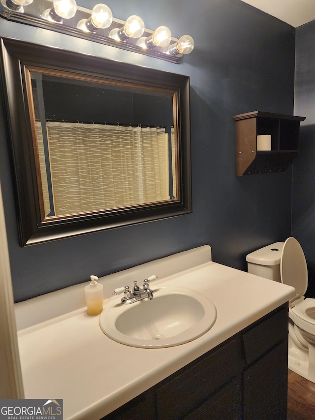 1751 Bridle Ln, Macon, GA 31220 - bathroom featuring toilet and vanity