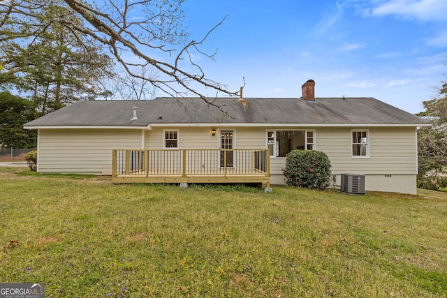 1312 Milstead Ave NE, Conyers, GA 30012 - back of property with a deck, crawl space, a yard, and a chimney