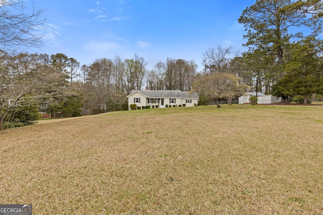 1312 Milstead Ave NE, Conyers, GA 30012 - view of front facade with view of wooded area