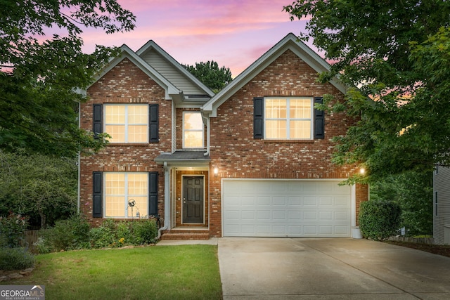 2009 Parador Aly, Mcdonough, GA 30253 - traditional-style house with driveway, an attached garage, a front lawn, and brick siding