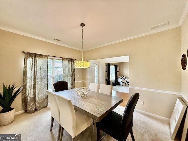3205 Anneewakee Falls Parkway, Douglasville, GA 30135 - dining area with ornamental molding and light carpet