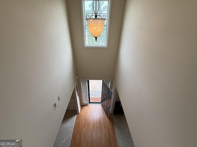 3205 Anneewakee Falls Parkway, Douglasville, GA 30135 - staircase featuring plenty of natural light, a high ceiling, and wood finished floors