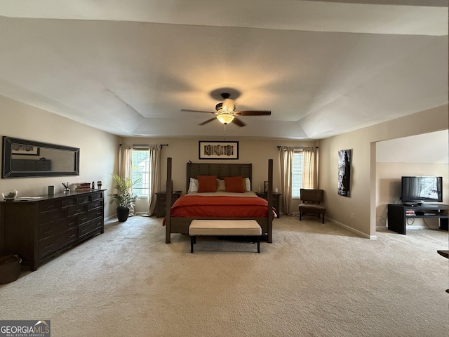 3205 Anneewakee Falls Parkway, Douglasville, GA 30135 - bedroom with light carpet, a tray ceiling, and ceiling fan