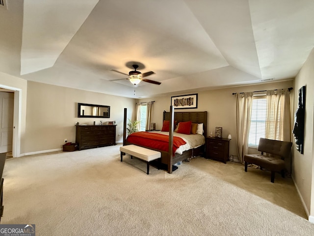 3205 Anneewakee Falls Parkway, Douglasville, GA 30135 - bedroom with light colored carpet, a raised ceiling, and multiple windows