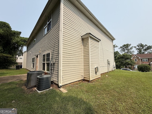 3205 Anneewakee Falls Parkway, Douglasville, GA 30135 - view of home's exterior with a central AC unit and a lawn