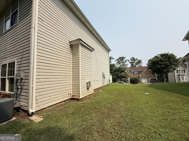 3205 Anneewakee Falls Parkway, Douglasville, GA 30135 - view of side of property with a cooling unit and a lawn