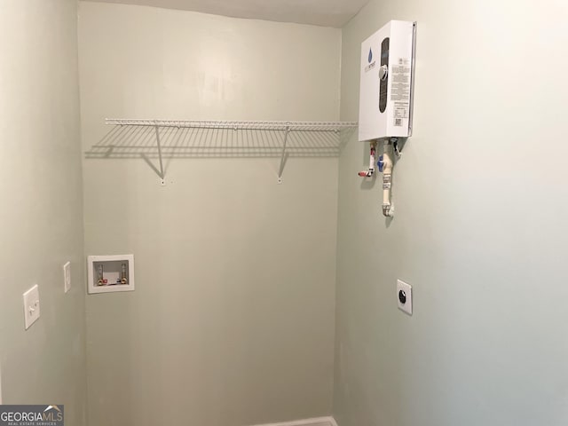 3433 Sandra Fay Dr, Macon, GA 31206 - laundry room featuring electric dryer hookup, hookup for a washing machine, and tankless water heater