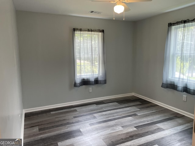 3433 Sandra Fay Dr, Macon, GA 31206 - empty room featuring ceiling fan, wood finished floors, and baseboards