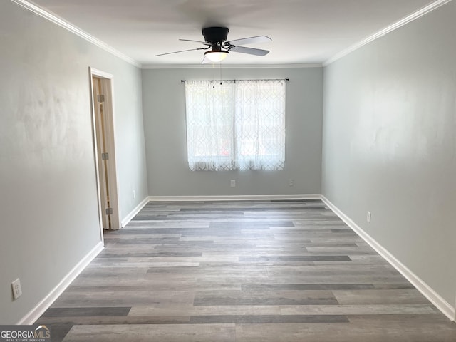 3433 Sandra Fay Dr, Macon, GA 31206 - unfurnished room featuring ceiling fan, wood finished floors, ornamental molding, and baseboards