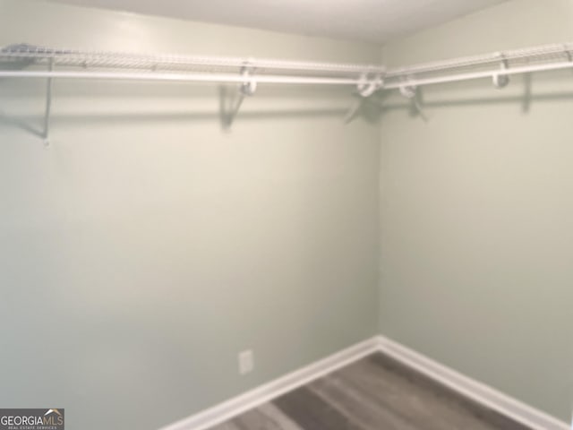 3433 Sandra Fay Dr, Macon, GA 31206 - spacious closet with wood finished floors