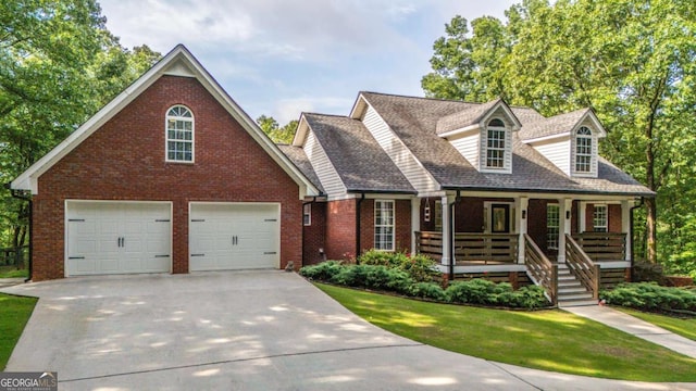 180 Mountain Path, Rockmart, GA 30153 - cape cod home with brick siding, a porch, a garage, driveway, and a front yard