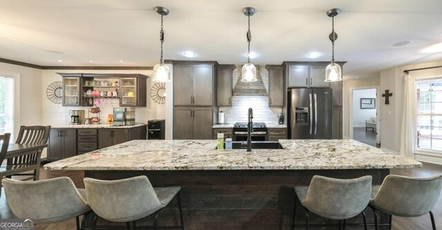 180 Mountain Path, Rockmart, GA 30153 - kitchen featuring stainless steel appliances, tasteful backsplash, a large island, a kitchen breakfast bar, and recessed lighting