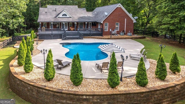 180 Mountain Path, Rockmart, GA 30153 - outdoor pool with a patio, a fenced backyard, and a deck