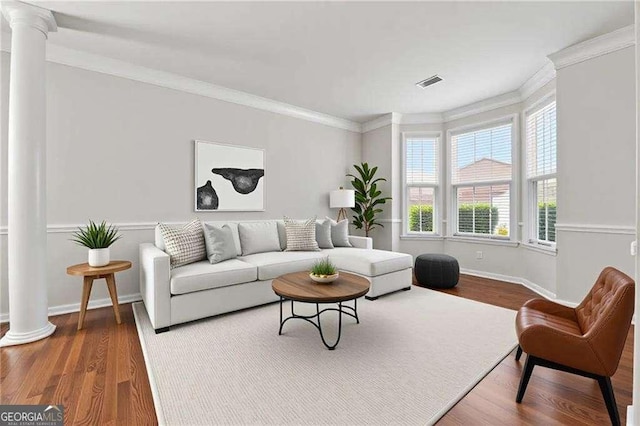 3134 Flery Way, Lawrenceville, GA 30046 - living area with ornate columns, crown molding, and wood finished floors