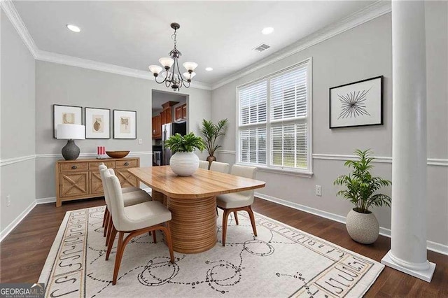 3134 Flery Way, Lawrenceville, GA 30046 - dining space featuring decorative columns, a chandelier, ornamental molding, baseboards, and dark wood finished floors