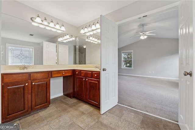 3134 Flery Way, Lawrenceville, GA 30046 - full bathroom with double vanity, baseboards, a ceiling fan, and lofted ceiling