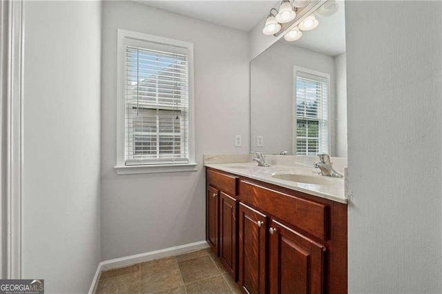 3134 Flery Way, Lawrenceville, GA 30046 - bathroom featuring double vanity and baseboards