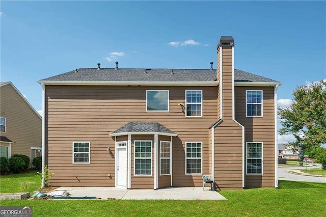 3134 Flery Way, Lawrenceville, GA 30046 - rear view of property with a patio area, a chimney, and a yard
