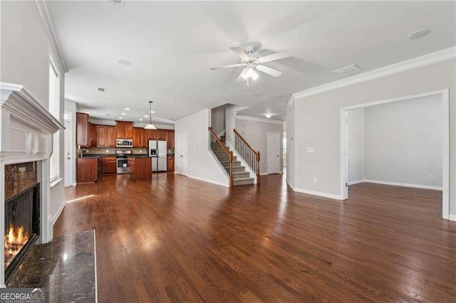 3134 Flery Way, Lawrenceville, GA 30046 - unfurnished living room featuring a fireplace, stairway, baseboards, crown molding, and a ceiling fan