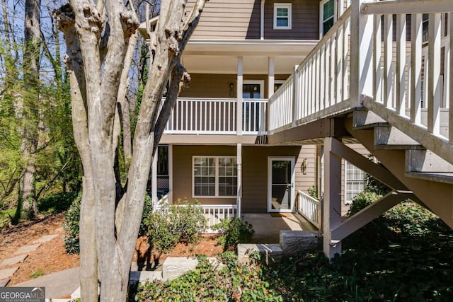 2135 N Forest Trl, Atlanta, GA 30338 - back of property featuring a balcony and covered porch