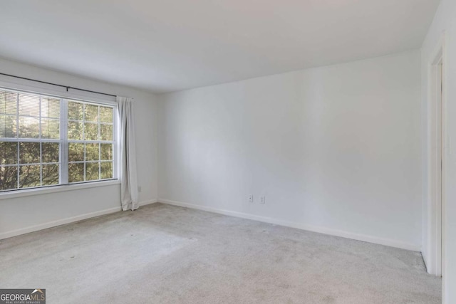 2135 N Forest Trl, Atlanta, GA 30338 - carpeted spare room with baseboards