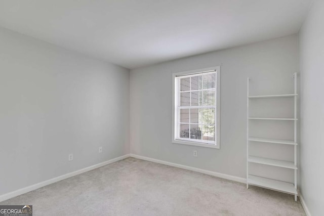 2135 N Forest Trl, Atlanta, GA 30338 - unfurnished bedroom with light colored carpet and baseboards